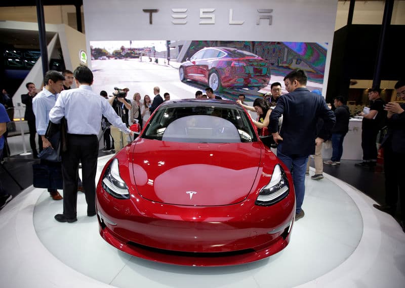 Tesla names close Musk friend Larry Ellison to board By Reuters