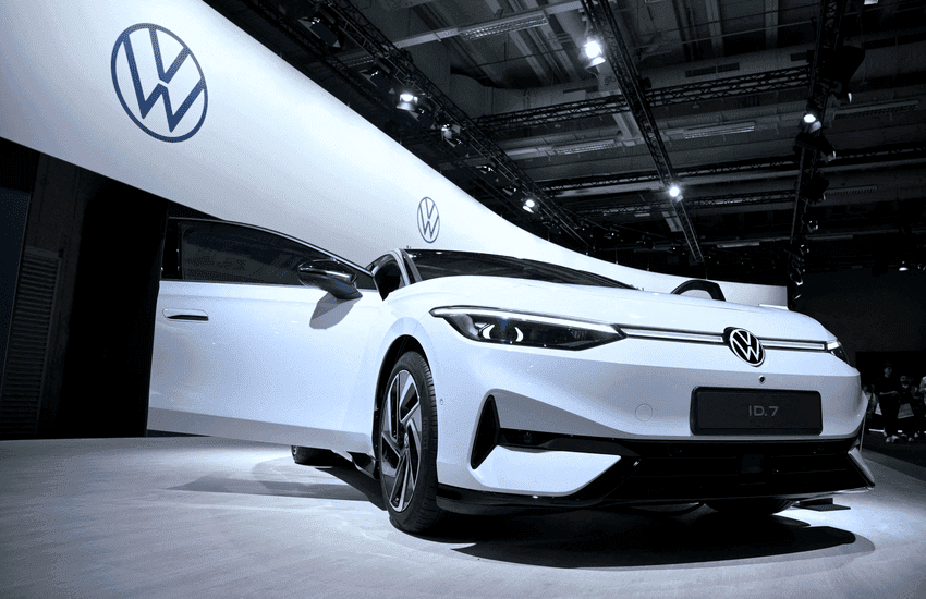 Volkswagen’s Global Balancing Act: Tariffs, Job Cuts & A New EV Future! cover