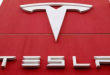 Tesla Falls as Musk's Feud with Trump Escalates Over Tax Bill and EV Credits cover