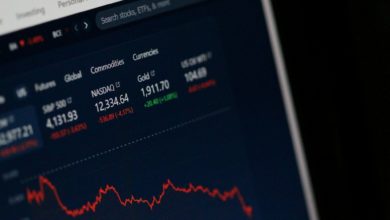 ​Stock Market Today: Tech Stocks Drag Markets Lower as Investors Eye Retail and Fed Signals cover