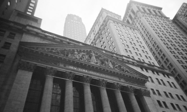 A black and white photo of a building in new york city