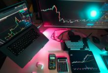 A laptop computer sitting on top of a desk
