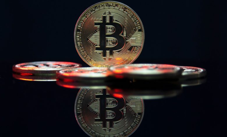 a bit coin sitting on top of a table