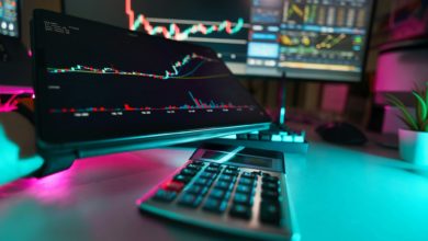A desk with a keyboard and a monitor