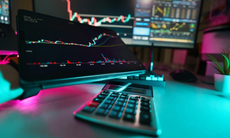 A desk with a keyboard and a monitor
