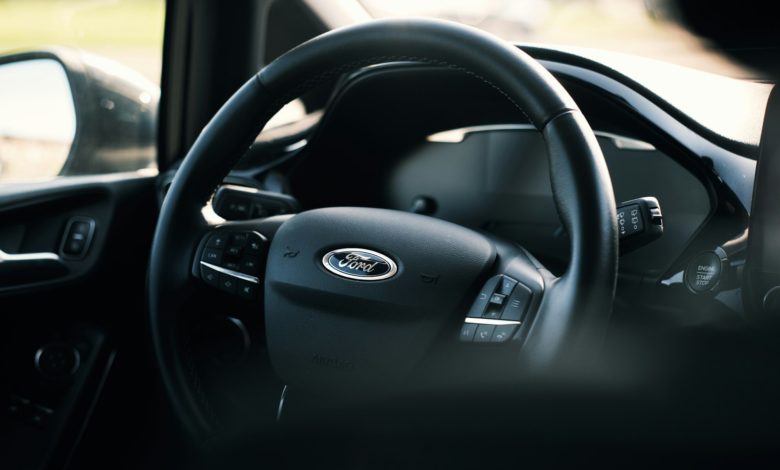 black nissan car steering wheel