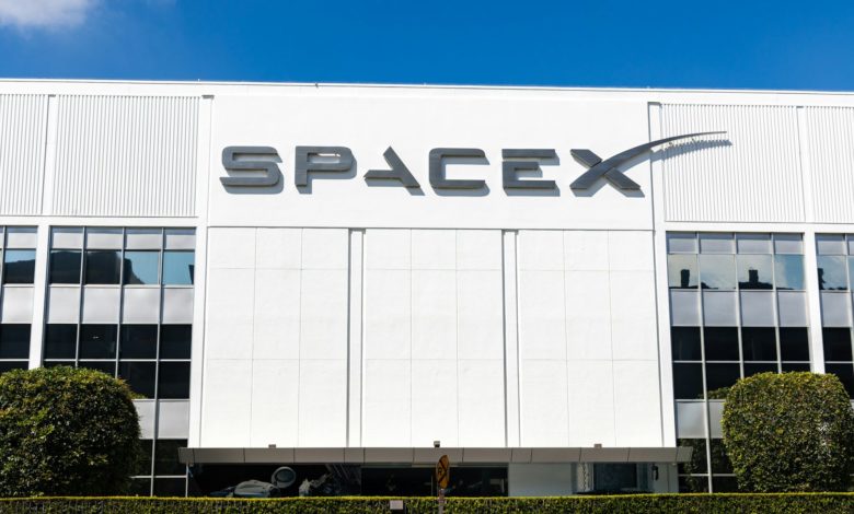 a building with a sign that says spacex on it