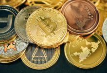 a pile of gold and silver bitcoins